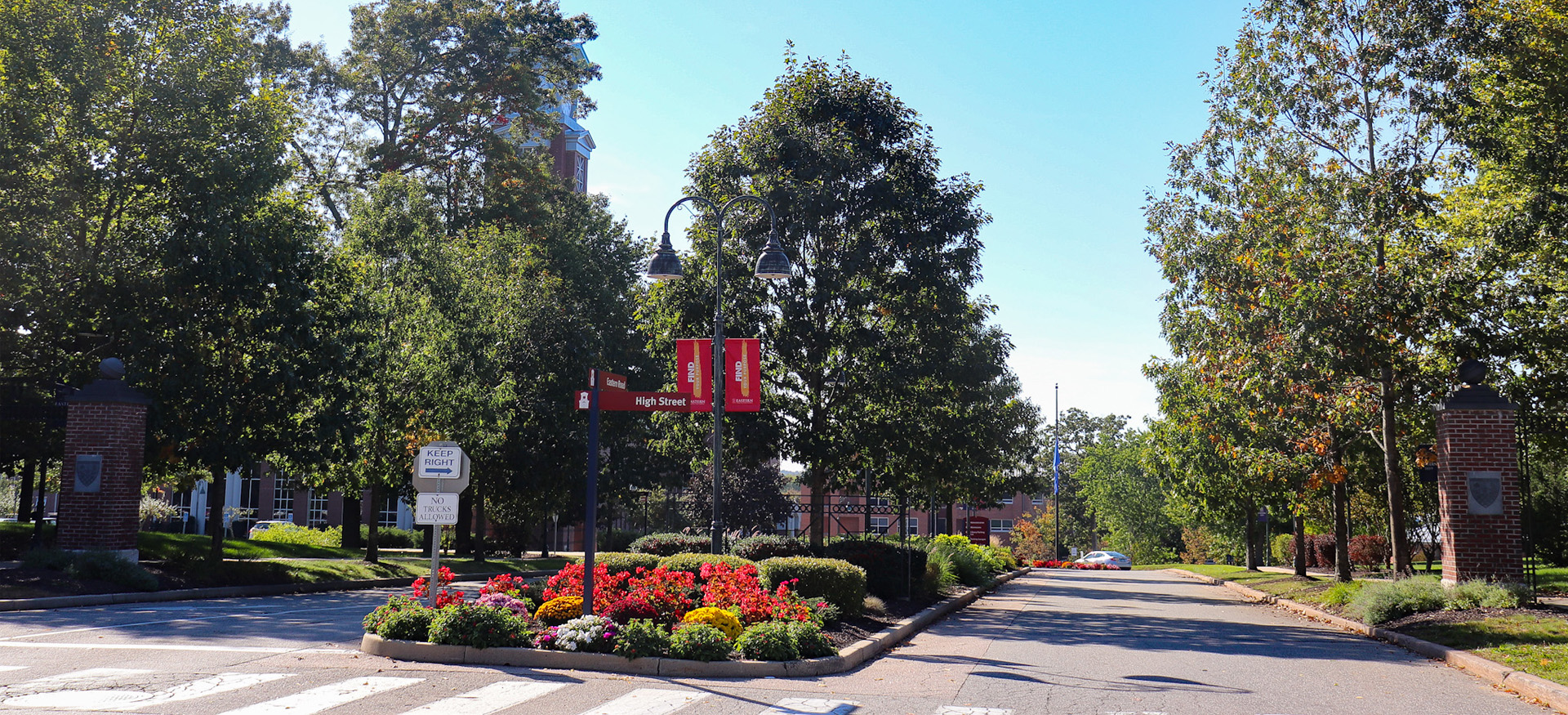 view of the entrance to Eastern with blooming flowers