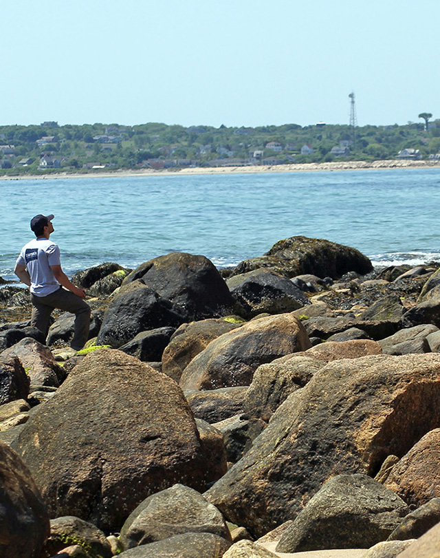 person observing the shoreline