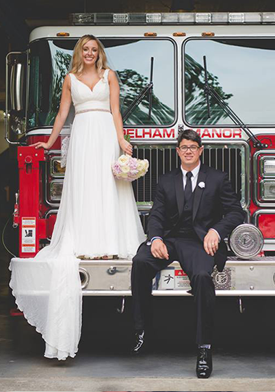 The Ruggieros wedding photo on a fire truck