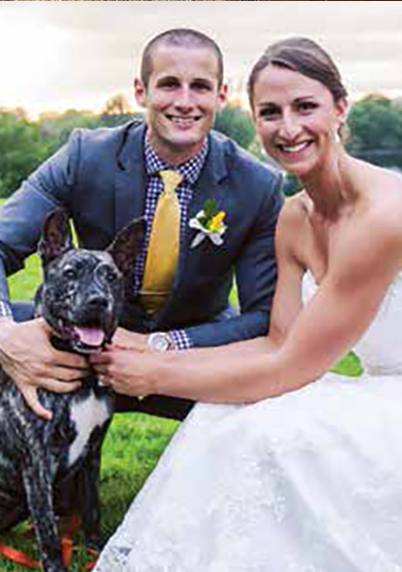 The Turners and their dog on their wedding day