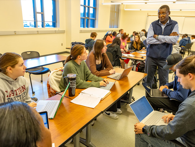 professor talking to students during class