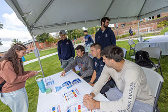 Student volunteers at voter registration booth