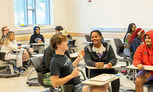 students talking during class